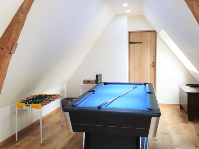 Pool Table and Table Football in the upstairs games area